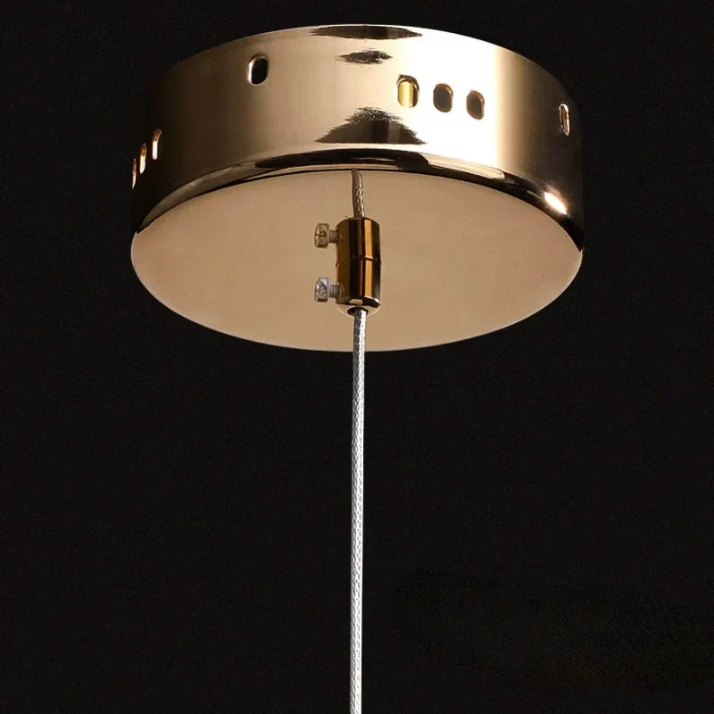DecorBites™ Crystal Ring Pendant Light: Rotatable Luxury Bedside Lighting for Bedroom