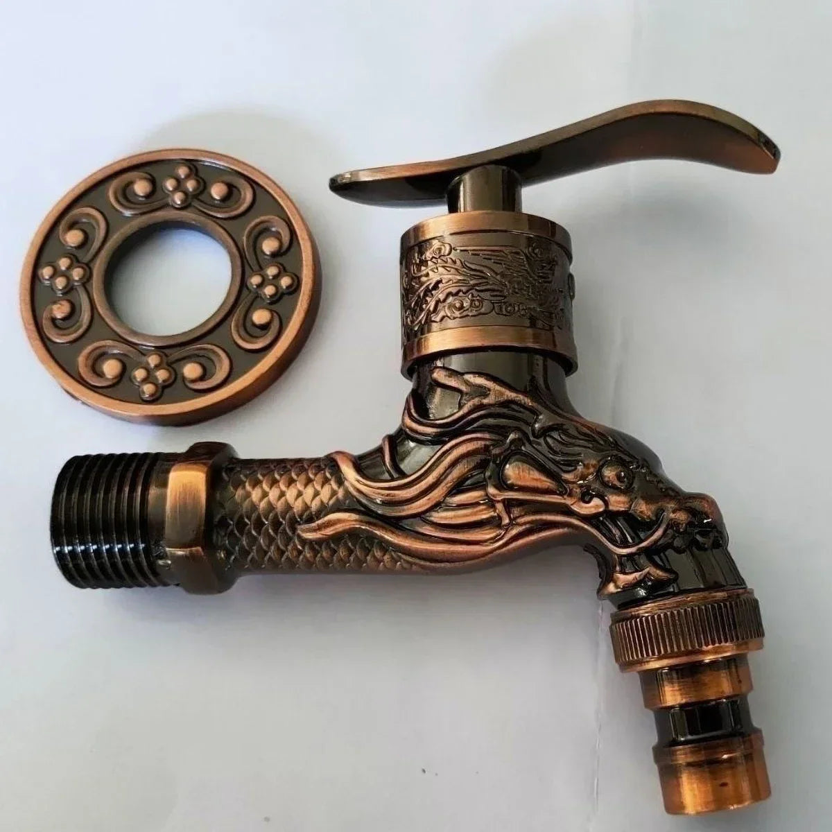 Antique European style wall mounted single hole cold water faucet with bronze finish and intricate dragon head design