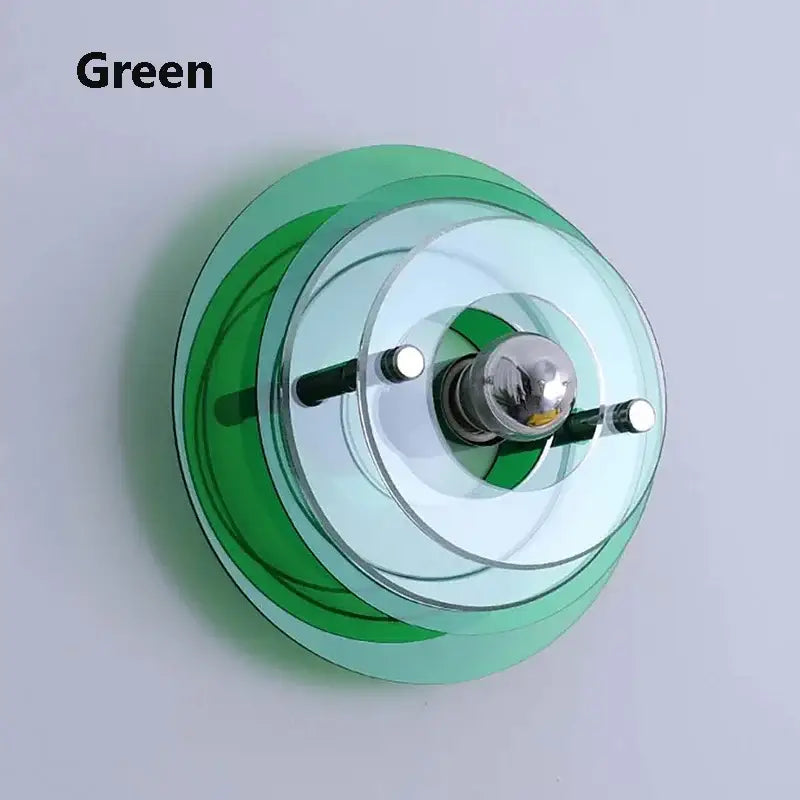 Green translucent glass bauhaus led wall sconce with concentric rings and chrome bulb holder for living room lighting