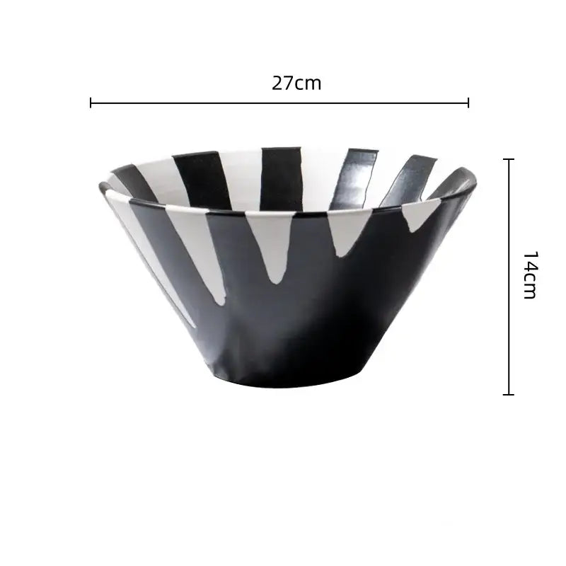 A sleek black and white check geometric ceramic bowl with modern tapered design for living room decor