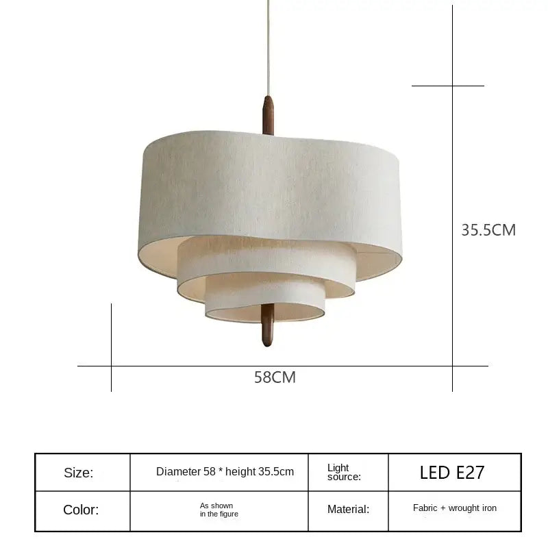 Beige layered fabric pendant lamp with wrought iron frame from decorbites bohemian wabi sabi linen decor for living room