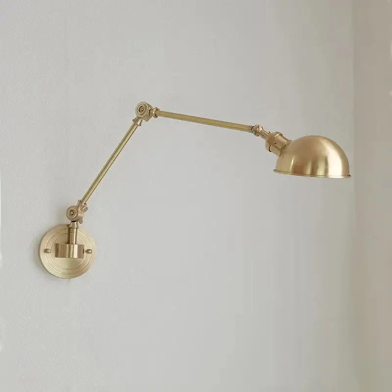 Brass wall lamp with adjustable articulated arm and dome shade featuring decorbites ceramic copper led design