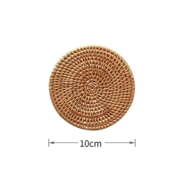 Clear glass cold brew latte drinkware set with a round 10cm natural tan woven rattan coaster with concentric pattern