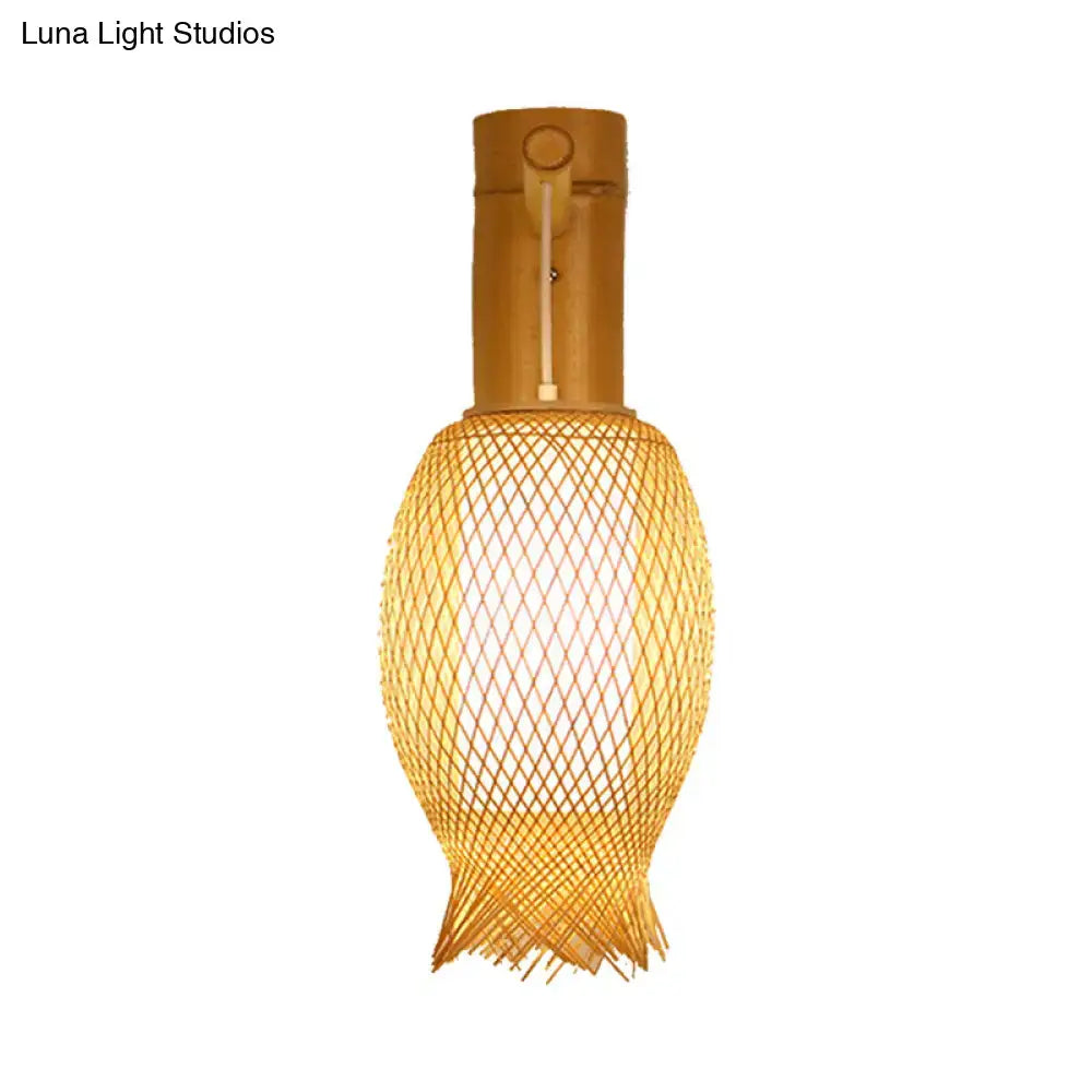 Contemporary bamboo wall light fixture with warm-toned woven diamond-patterned shade for bedroom lighting