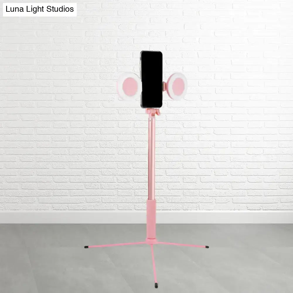 Contemporary style pink selfie stick with dual circular lights and usb port compatible with 220v-240v and 110v-120v