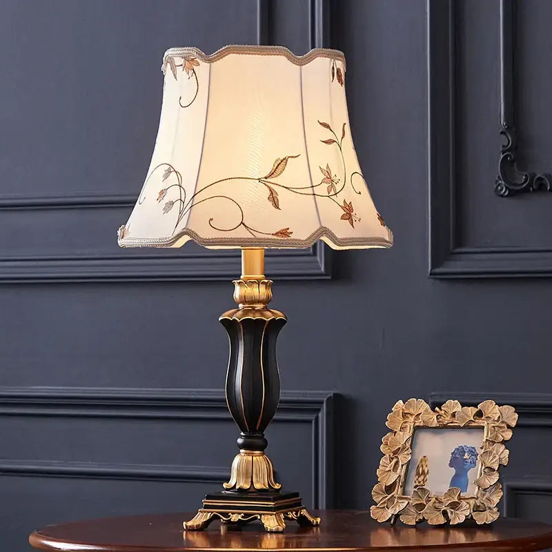 Elegant black and gold ornate desk lamp with cream fabric shade and brown floral embroidery for decorbites country pastoral desk