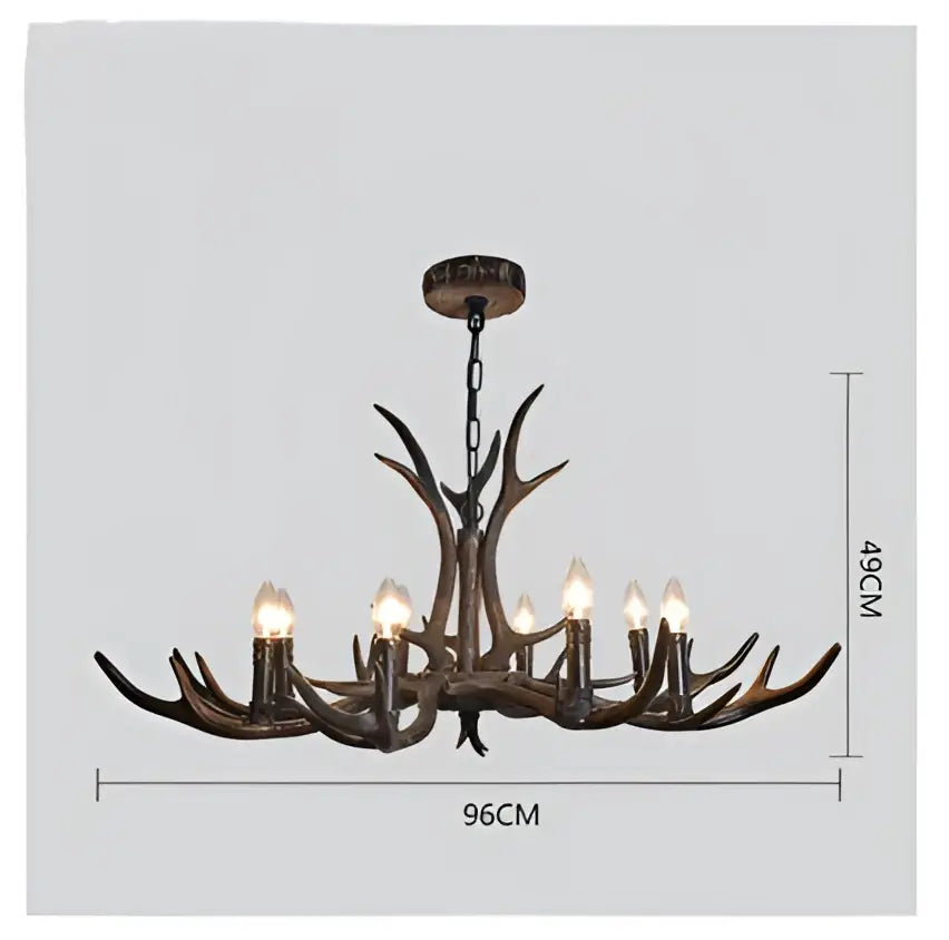 DecorBites antler resin chandelier with dark bronze finish and lit candle-style bulbs in American country retro style