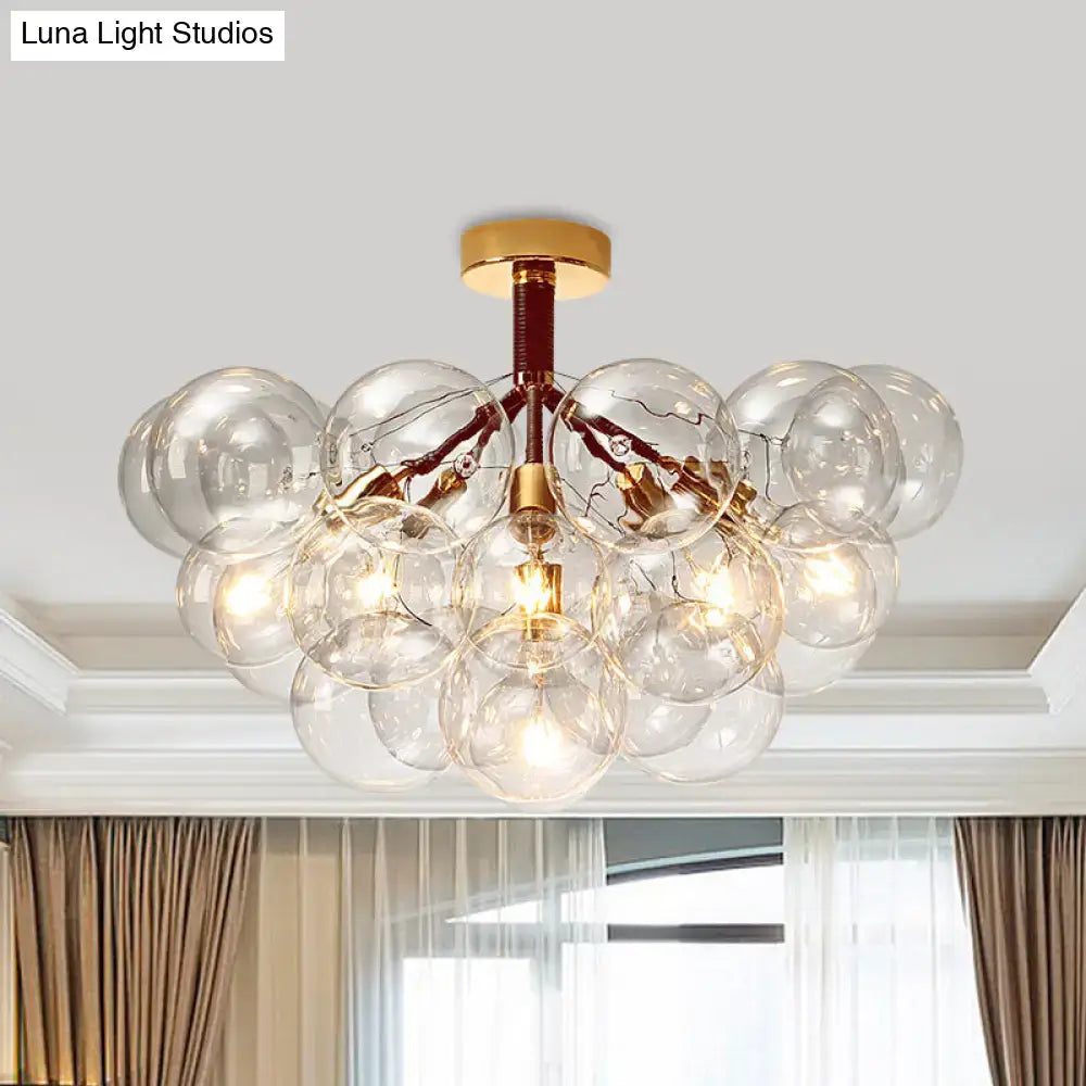 Decorbites™ clear glass semi flush ceiling light with gold metal accents and contemporary bubble design for foyer illumination
