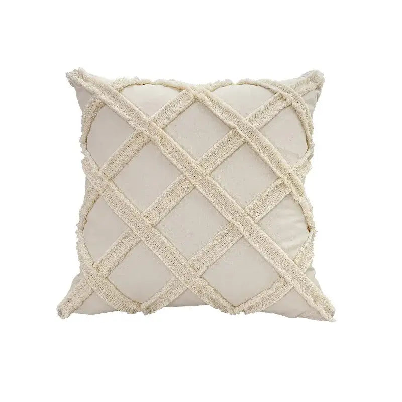 Cream-colored square pillow with a textured frayed lattice pattern in decorbites fringed geometry style for living room