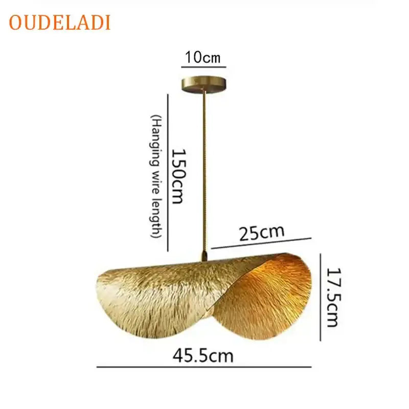 Gold-colored textured lotus leaf copper pendant light with brass finish by decorbites lotus leaf for kitchen island decor