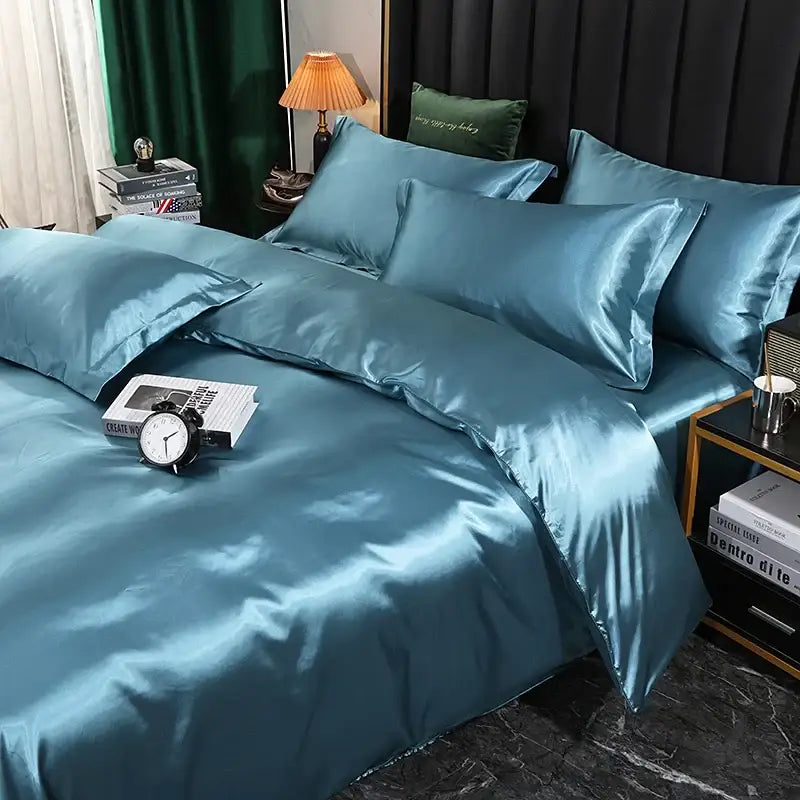 Teal satin duvet cover and pcs bed sheet with glossy finish and matching pillowcases from decorbites silk luxury bedding set