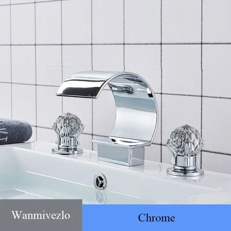 Chrome finished DecorBites™ waterfall bathroom basin faucet with crystal knob handles for hot and cold mixer use