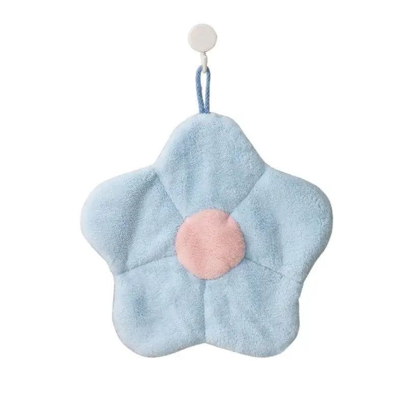 Light blue star-shaped coral fleece hand towel with soft pink center from decorbites coral fleece bathroom collection