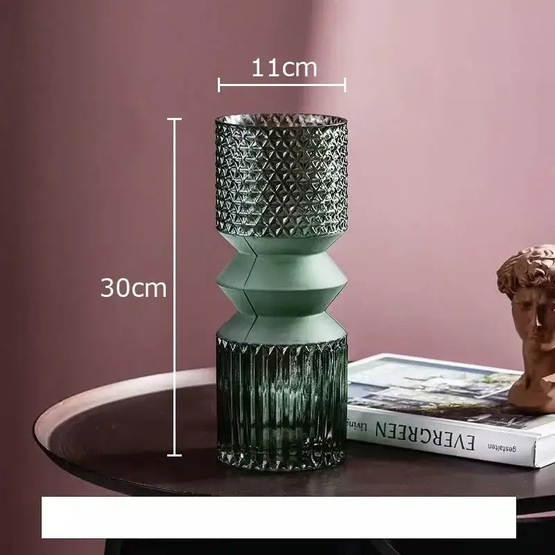 A tall segmented green crystal clear glass vase with textured upper section and ribbed base for living room decorbites decor