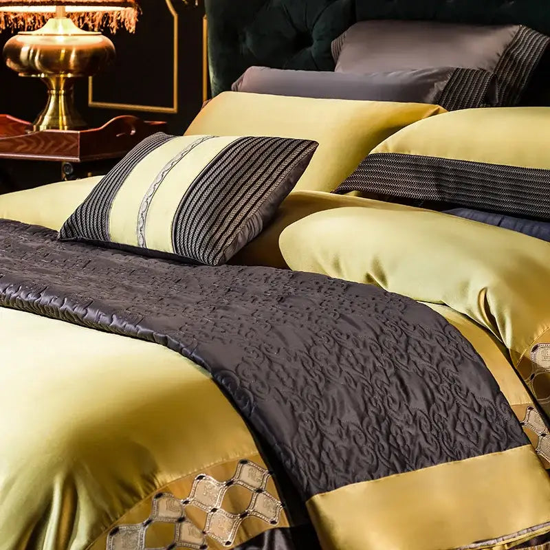 Luxurious gold and dark gray satin 200s embroidery Egyptian cotton bedding set with quilted patterns and striped pillows