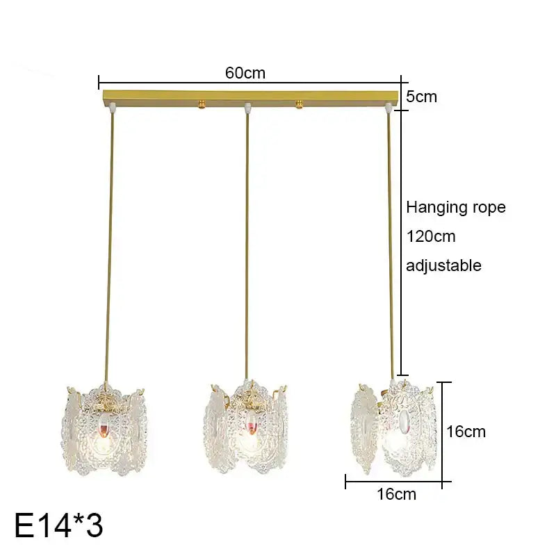 Gold-toned glass pearl chandelier with carved glass pearl shades and adjustable ropes for dining room decorbites decor