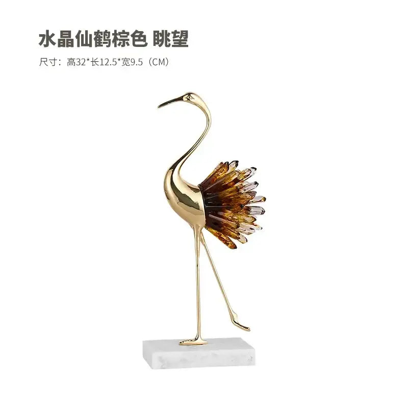 Golden bird agate marble crane statue with crystal brown and amber wings on white marble base for home decor