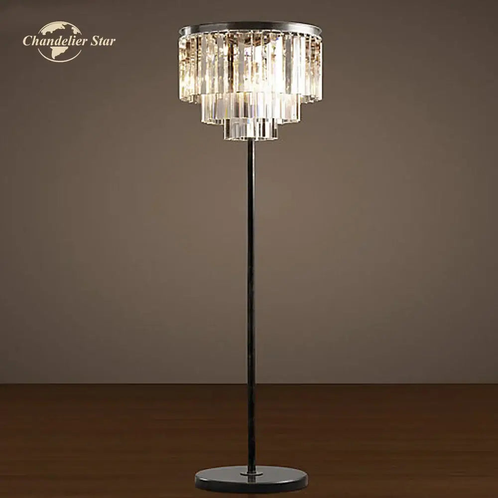 Industrial crystal led floor lamp with tiered glass prisms and sleek black chrome stand for modern living room decorbites