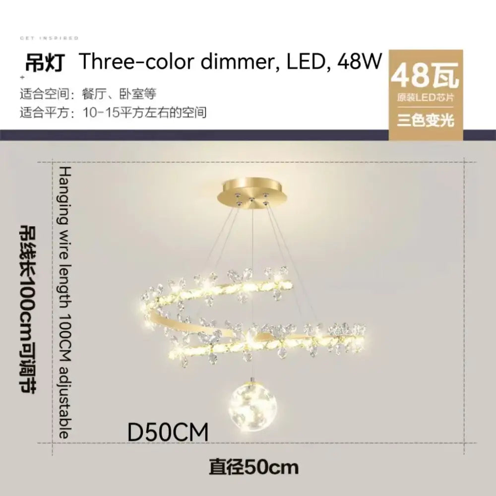 Luxury crystal gold ceiling chandelier with gold-toned spiral design, crystal accents, spherical pendant, and three-color led lighting