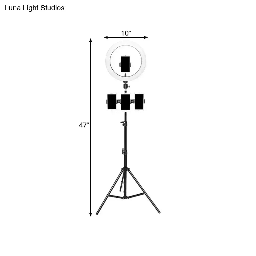 Black tripod-mounted ring light with three rectangular panels and luna light studios branding for mobile phone holder use