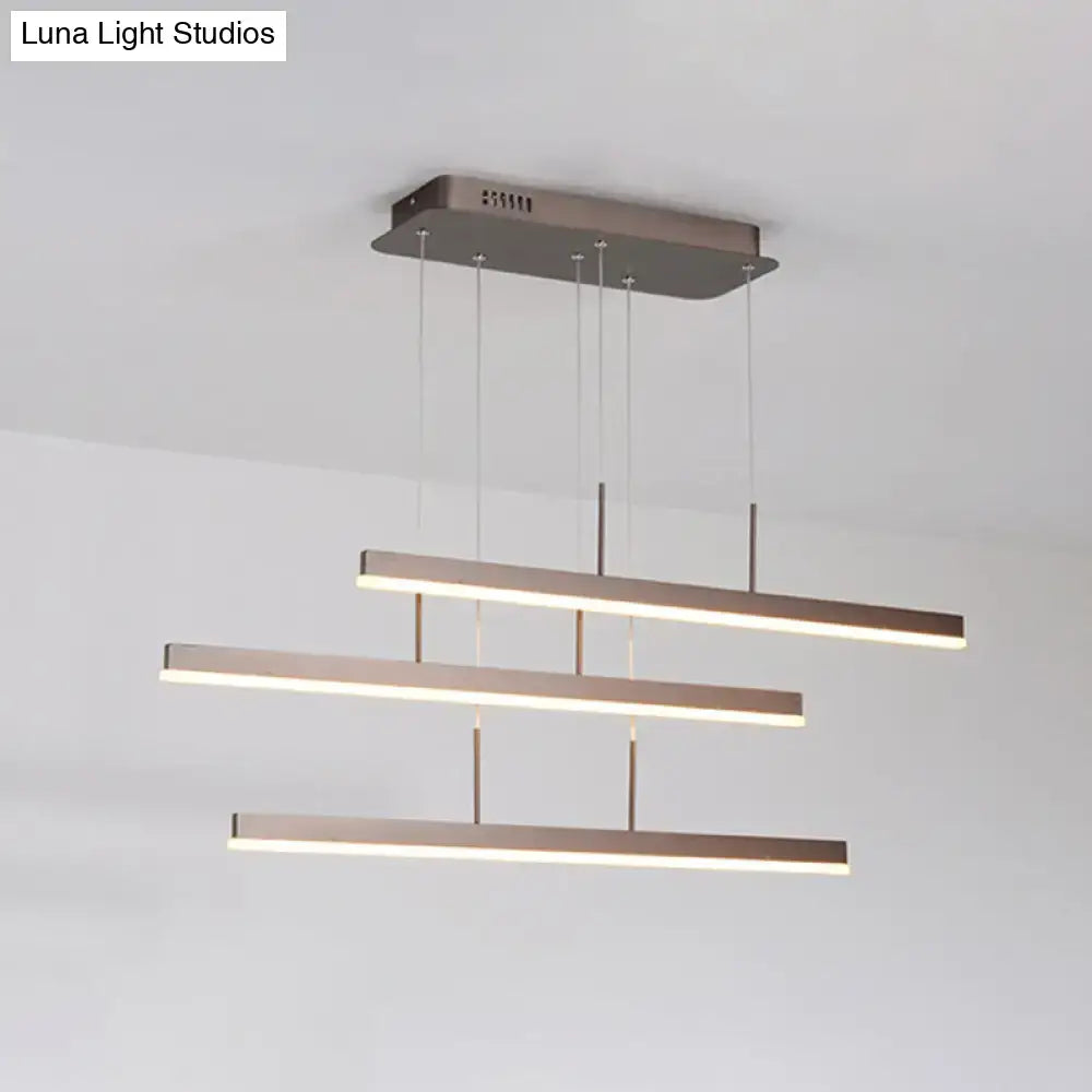Minimalist bronze acrylic pendant light with three horizontal led bars for dining room suspended by thin cables