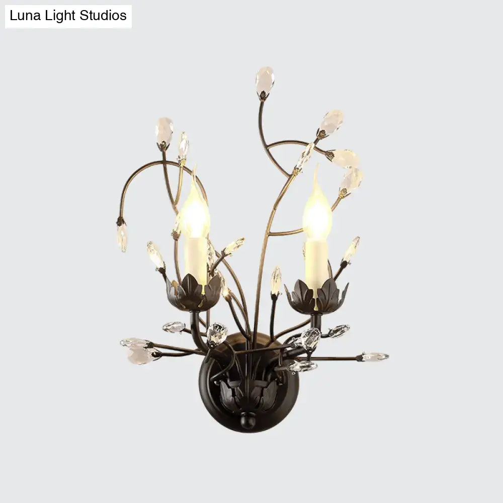 Minimalistic dark bronze wrought iron wall light with black crystal blossom accents and two candle-style sconce lamps