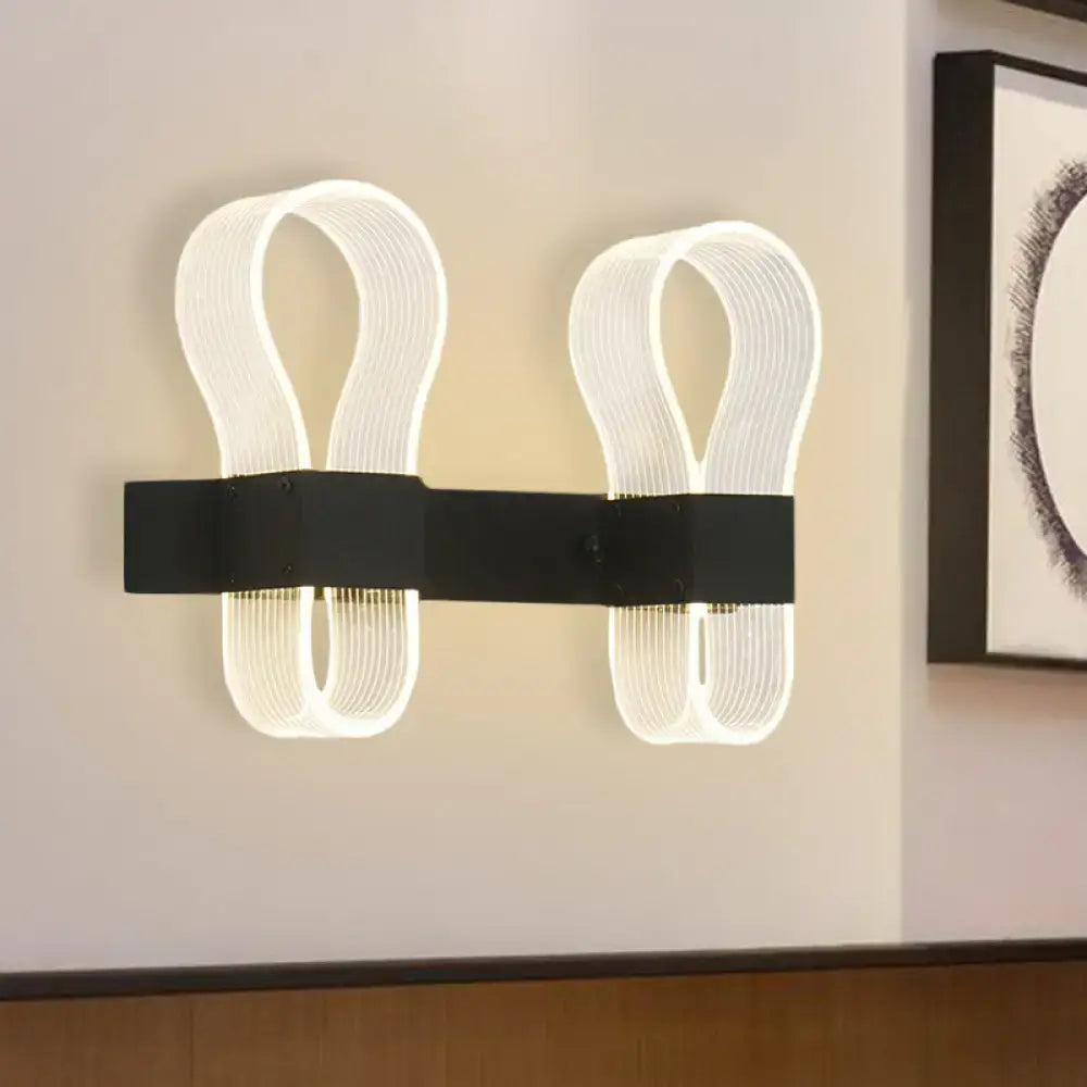 Modern white led wall lamp with sleek ribbed design and black arc ring sconce bracket for bedroom lighting