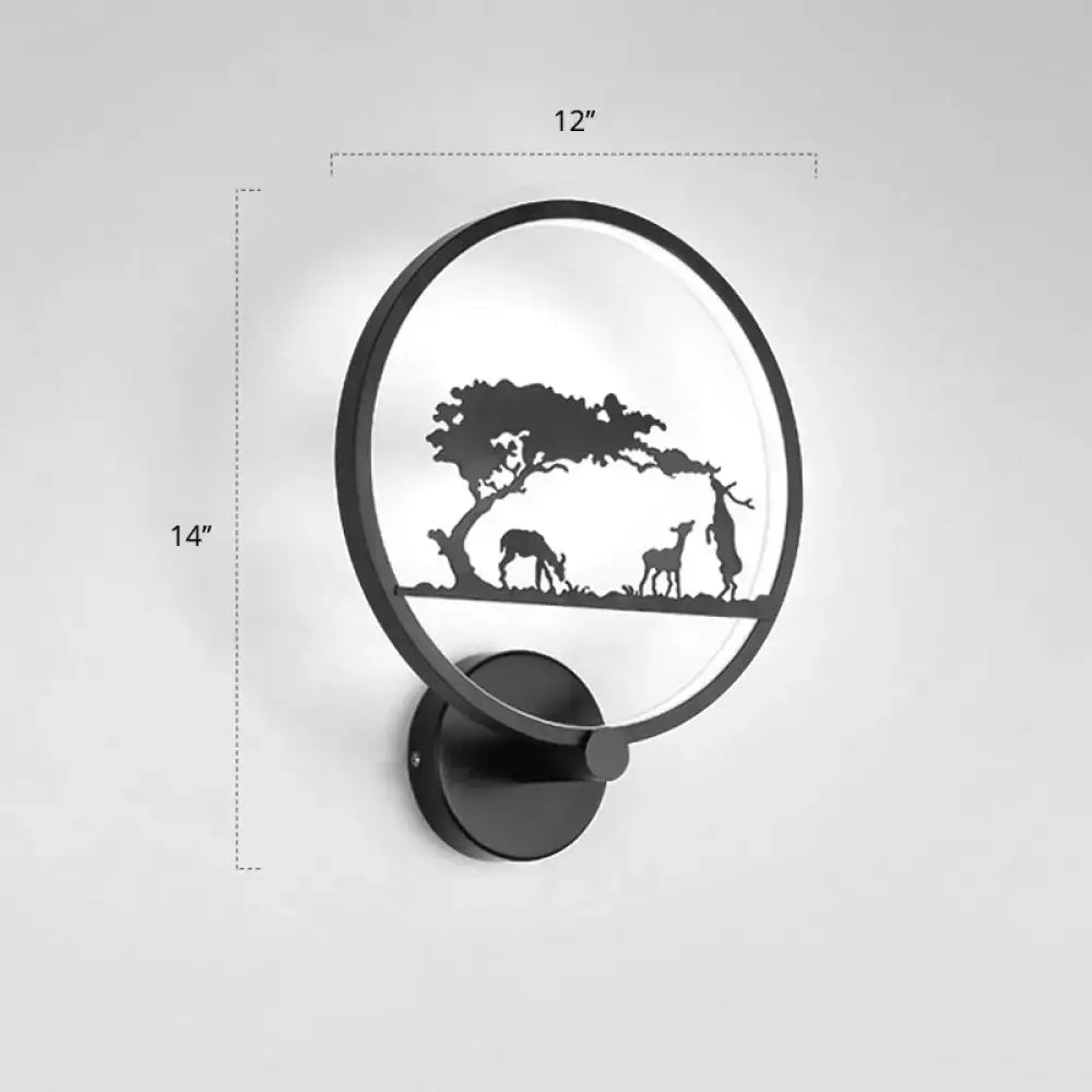 Modern black circular led wall sconce light fixture with minimalist deer and tree design on frosted glass panel, 12 inches high