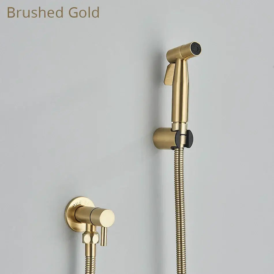 Brushed gold brass bidet faucet handheld shower sprayer with flexible braided hose and black accents for bathroom use