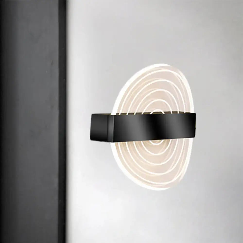 Modern black and gold wall lamp with concentric circular led light rings ideal choice for living room lighting