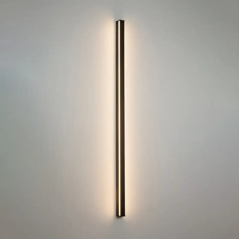 Modern black linear flush mount wall sconce with slim metallic frame and warm ambient lighting for hallway use