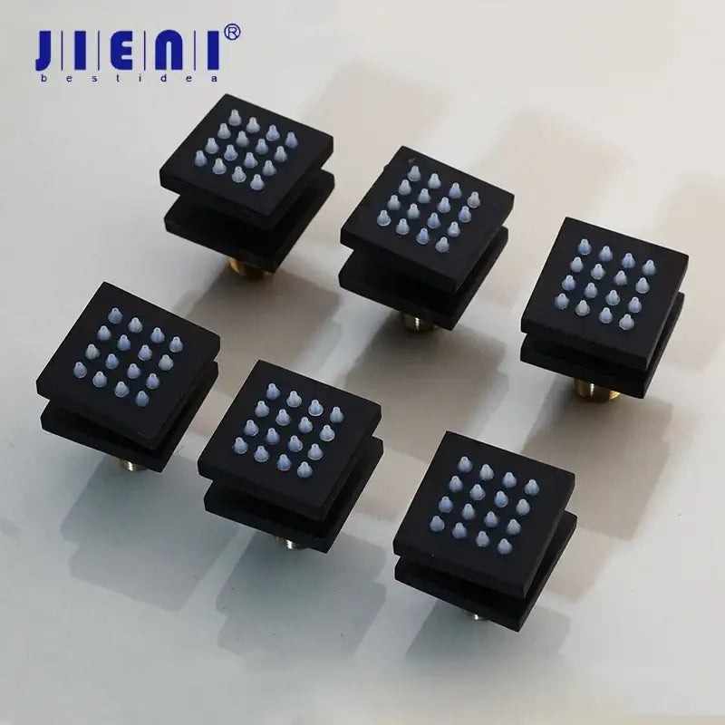 Modern black massage shower faucet with black square cabinet knobs featuring light blue dome accents decorbites black massage