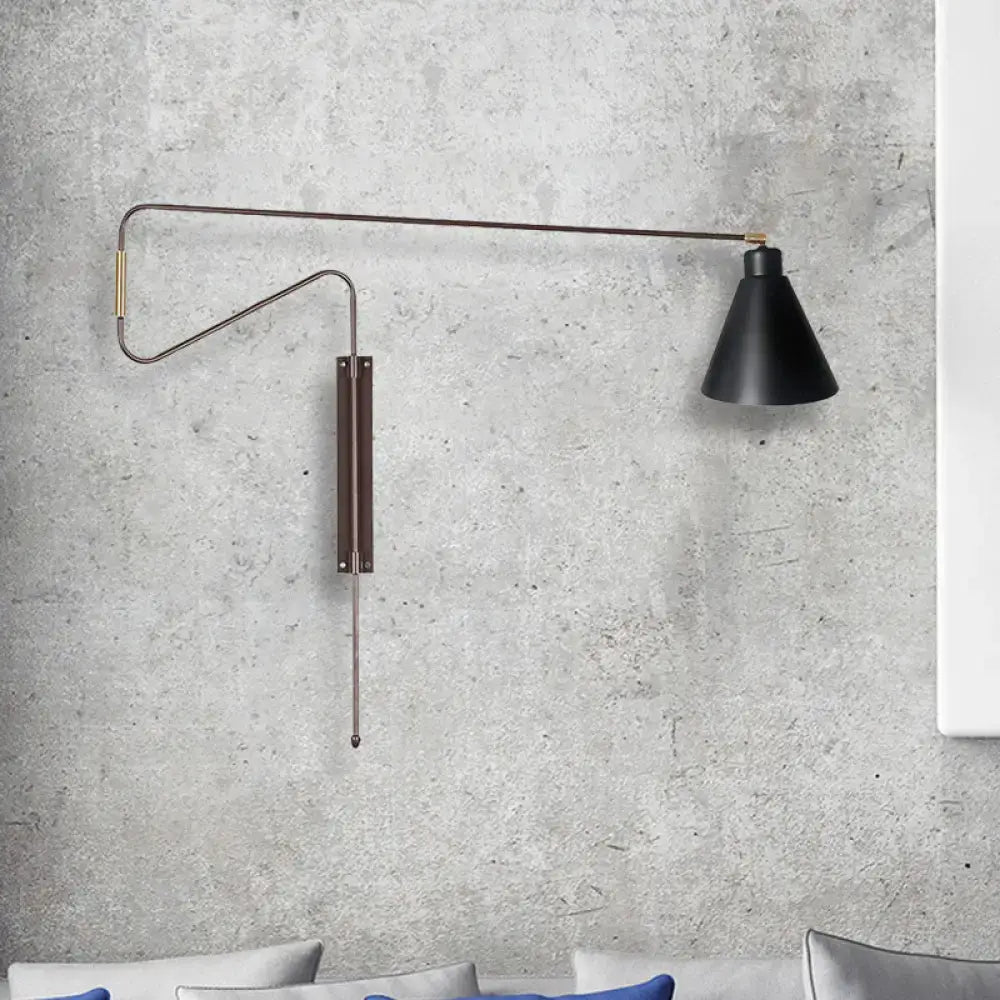 Modern black metal wall lamp featuring a conical shade, slender articulated arm, and black gold brass accents for living room