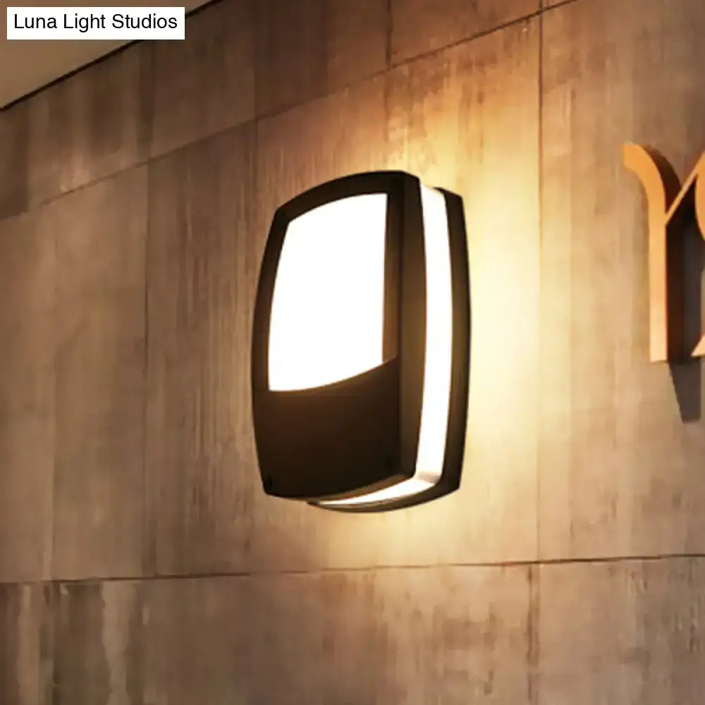 Modern black outdoor led wall lamp with sleek rectangular design mounted light fixture providing warm ambient lighting