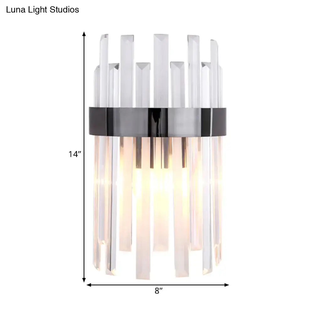 Modern black wall lamp with sleek black chrome band and clear icicle crystal prisms for dining room lighting