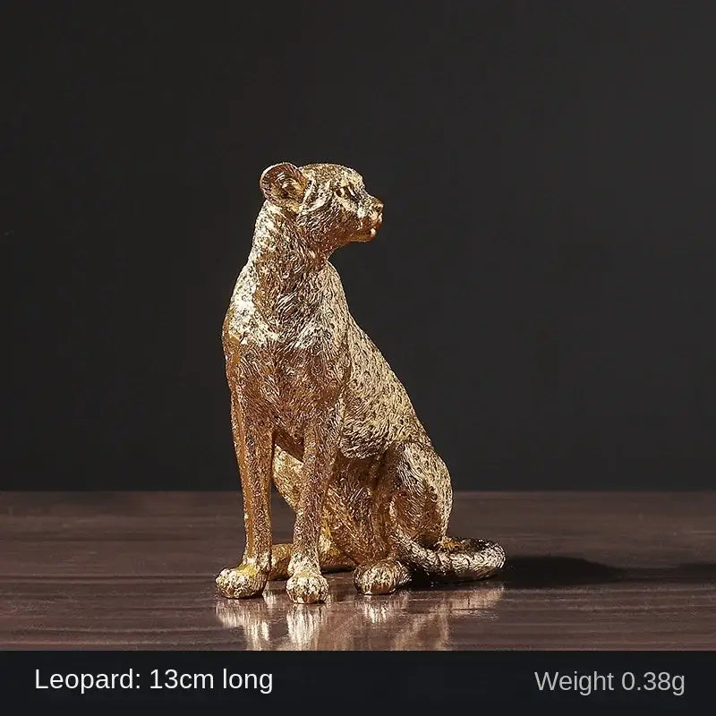 Golden bronze leopard statue with intricate texture and seated posture perfect for living room decorbites leopard statue