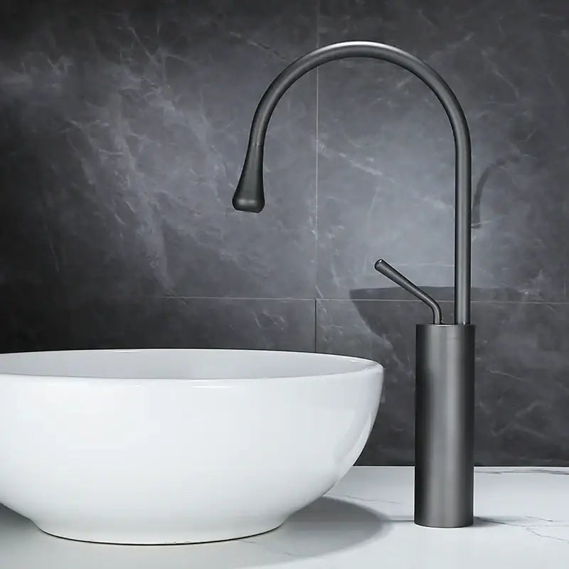 Modern brushed gold basin faucet with sleek curved spout and cylindrical base for bathroom swivel sink decorbites brushed gold