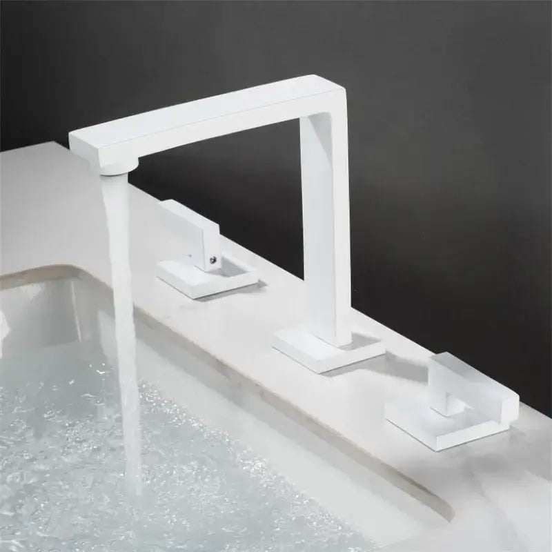 Modern brushed gold basin faucet with three handles and a waterfall spout by decorbites for bathroom sink use