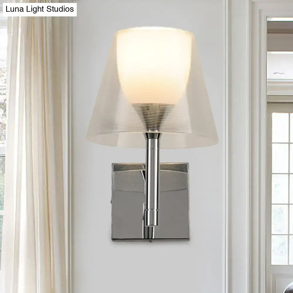 Modern chrome and white glass flared wall sconce with translucent diffused lampshade and subtle concentric ridges