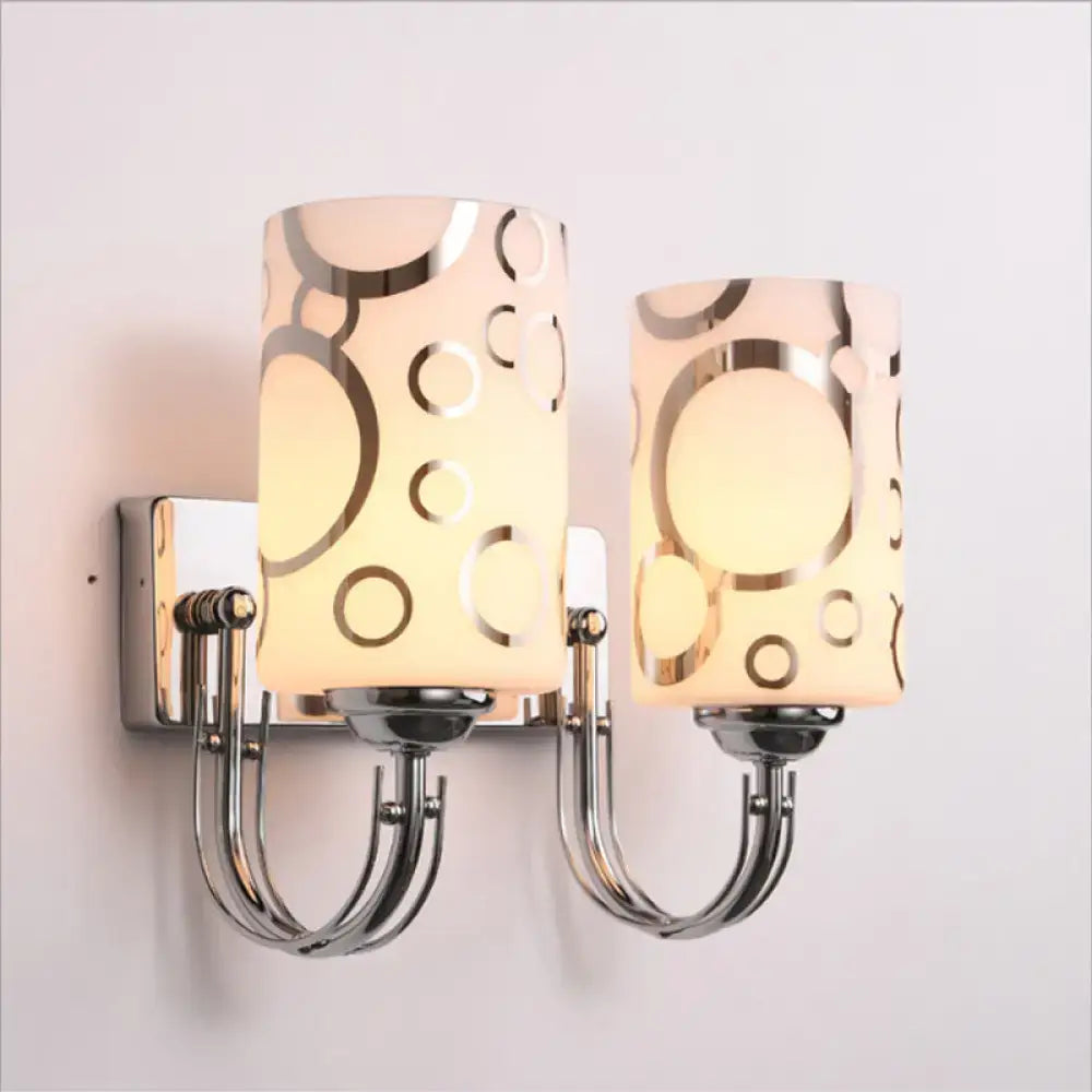 Modern chrome finish abstract glass wall sconce with two frosted glass shades and gold circle pattern 110v-120v