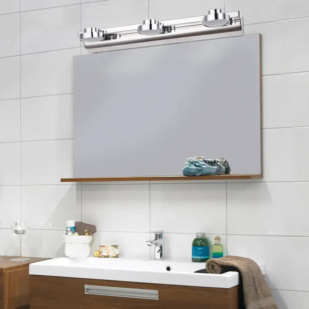 Modern chrome round wall lamp bathroom light with acrylic shade featuring a chrome-finished three-light wall lamp above mirror