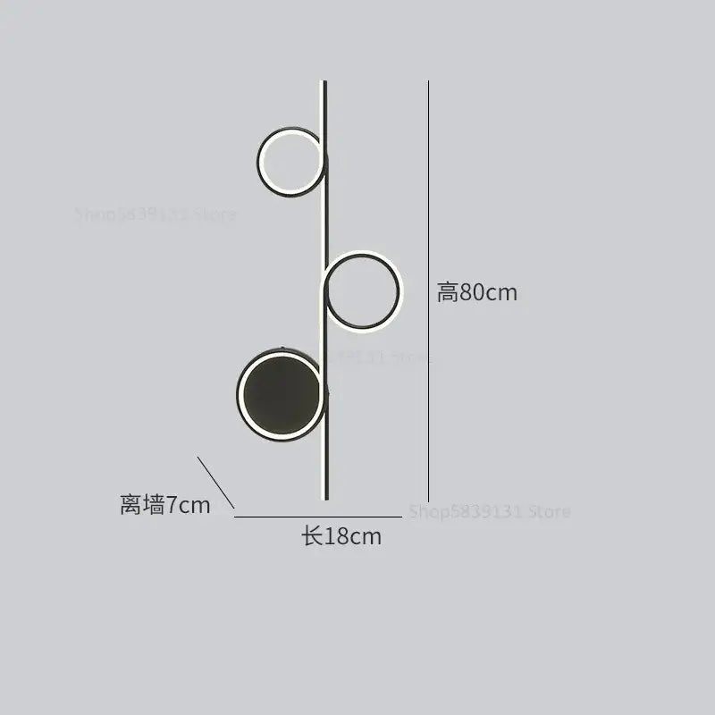 Modern circle straight bar wall lamp with three metallic circular shades in a vertical arrangement for bedroom decorbites circle straight