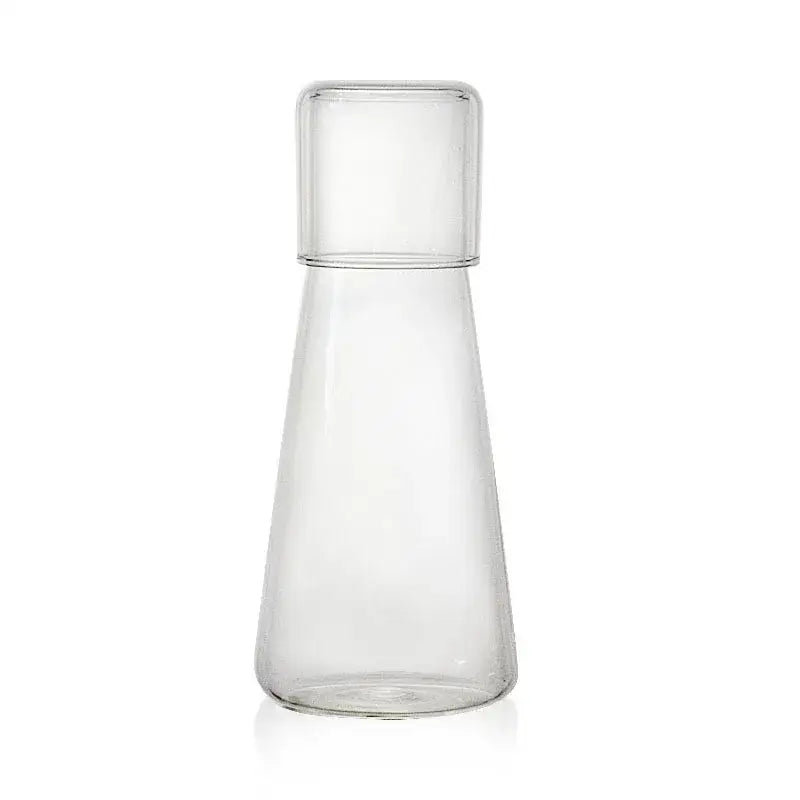 Modern clear glass bedside carafe set featuring decorbites clear glass carafe with matching lid for bedroom use
