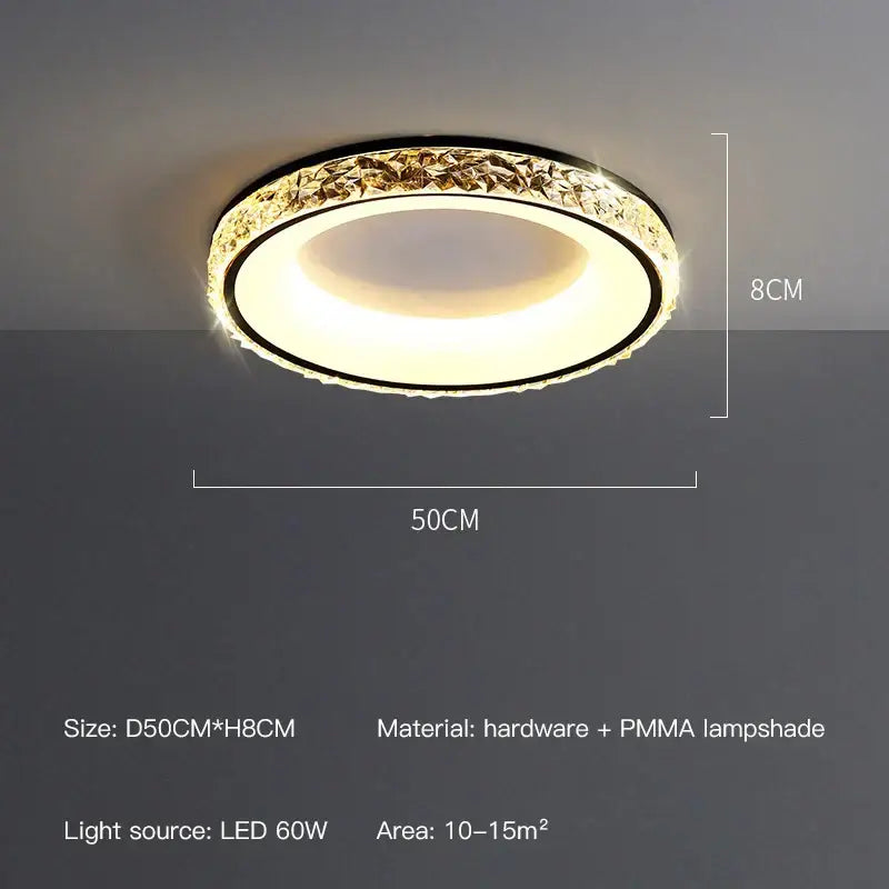 Modern concave round ceiling light with gold-toned crystal ring and warm white pmma lampshade by decorbites concave round