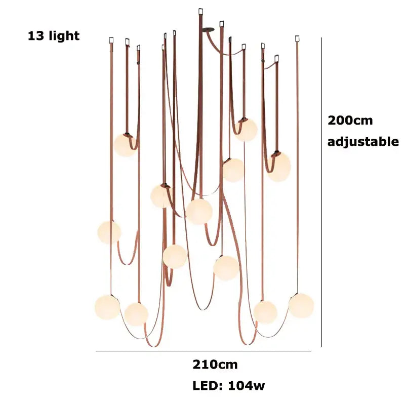 A modern black and orange decorbites glass ball led pendant light with 13 warm spherical lights and copper frame
