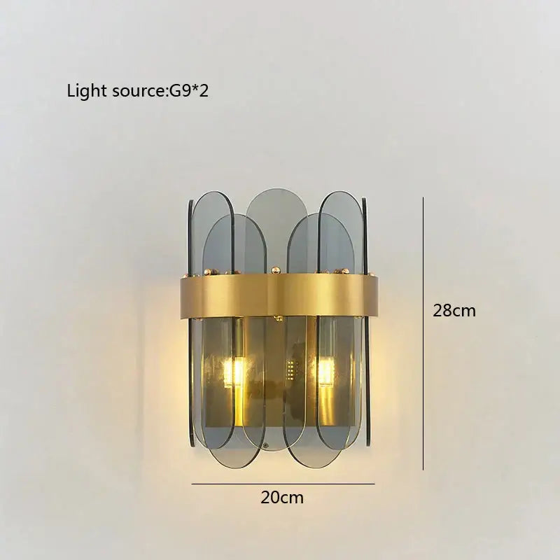Modern gold-toned wall sconce with frosted glass panels as a lighting solution enhancing dining experience