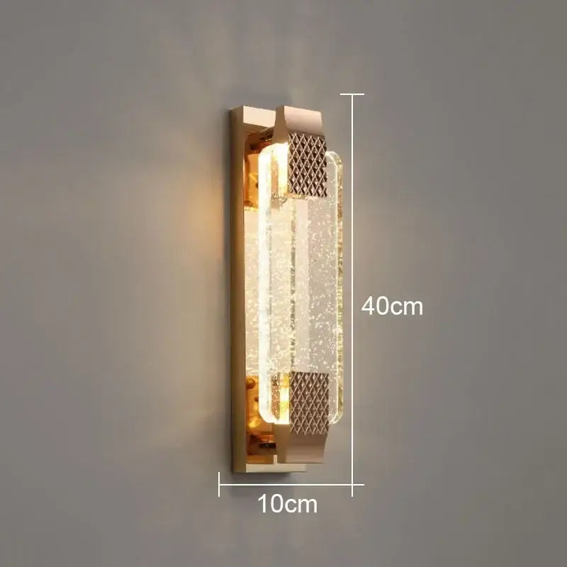 Modern gold wall lights with rectangular clear textured glass panels and metallic mesh decorbites crystal bubble design