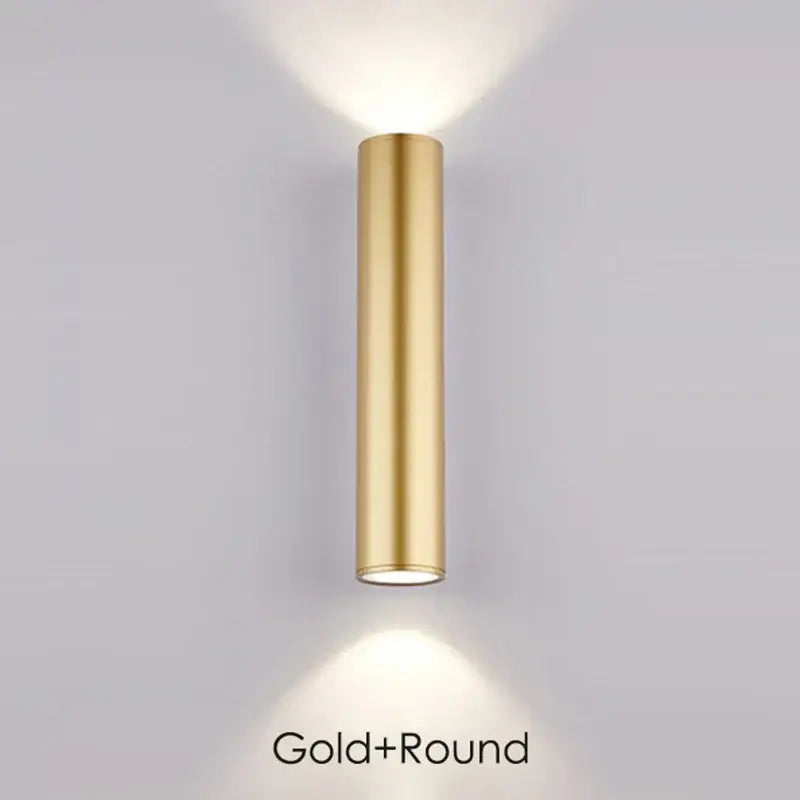 Modern gold led wall lamp by decorbites with a sleek cylindrical design for outdoor waterproof lighting decor
