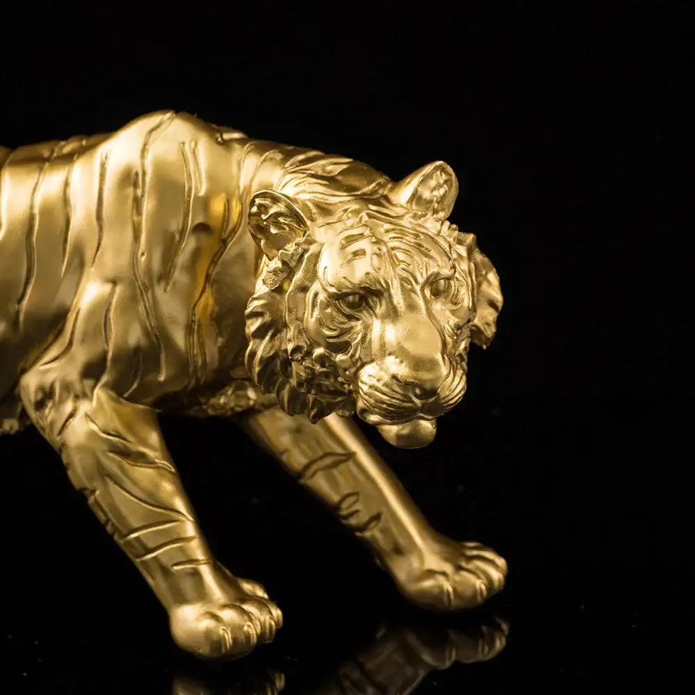 Golden tiger resin figurine with intricate detailing and polished metallic finish for modern living room decor