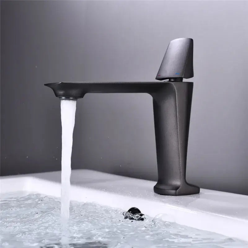 Modern matte black and white brass sink faucet with sleek angular design and tall spout for black brass bathroom decorbites use